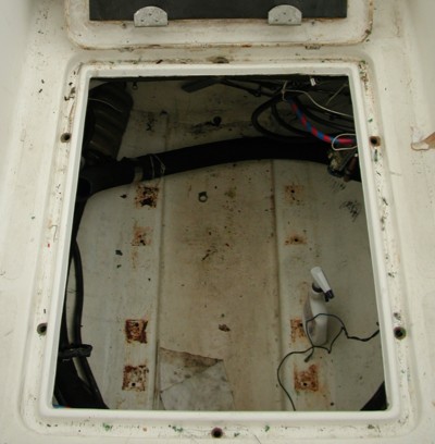 The engine compartment without the engine on our Prout Escale catamaran