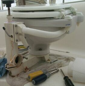 Prout Escale catamaran toilet getting repaired