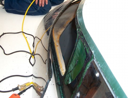 Removing bathroom window on our Prout Escale Catamaran
